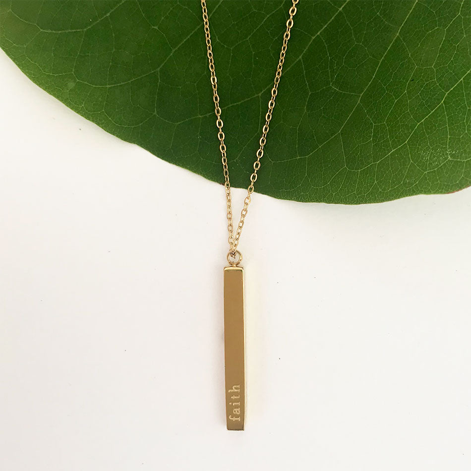 Fair trade gold faith necklace handmade by survivors of human trafficking
