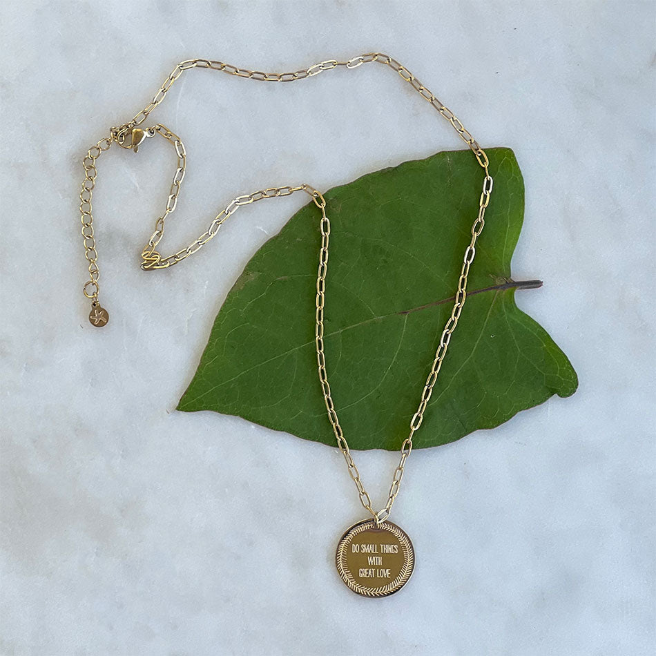 Ethical gold necklace handmade by survivors of human traffickiing