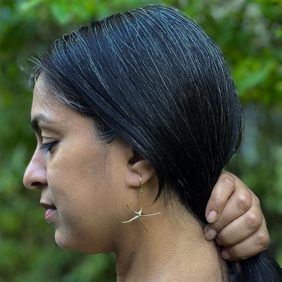 Fair trade starfish brass earrings ethically handmade by artisans in India