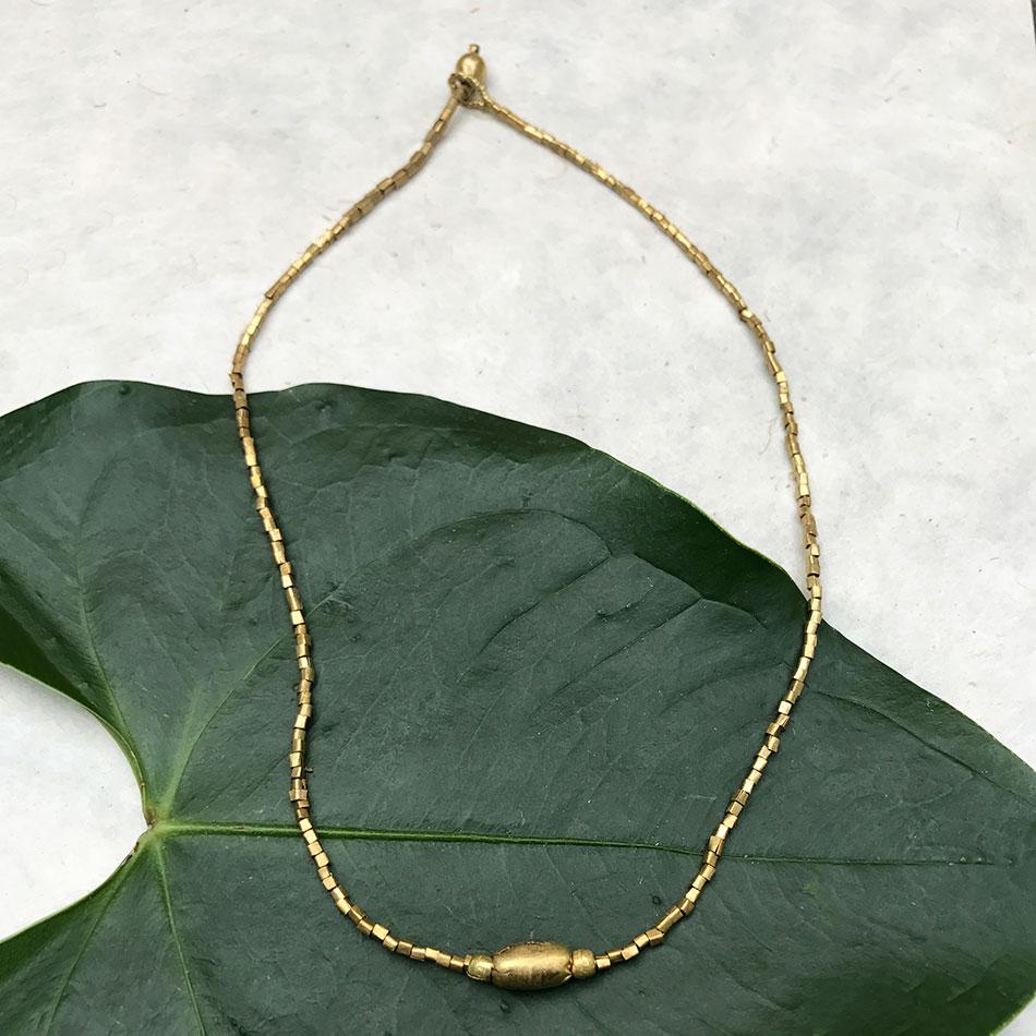 Fair trade recycled brass necklace handmade by women in Ethiopia