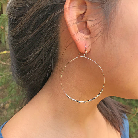 Fair trade earrings handmade by survivors of human trafficking