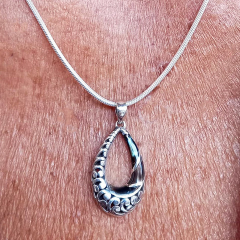 Fair trade abalone filigree necklace