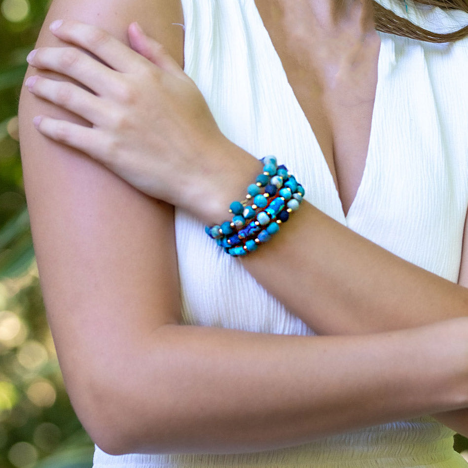 Fair trade recycled sari coil bracelet handmade by artisans in India.