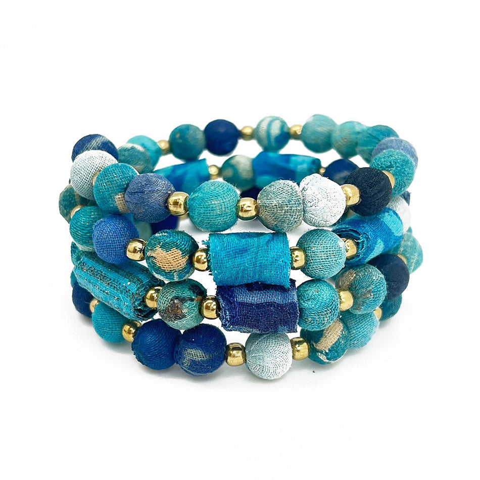 Fair trade recycled sari coil bracelet handmade by artisans in India.
