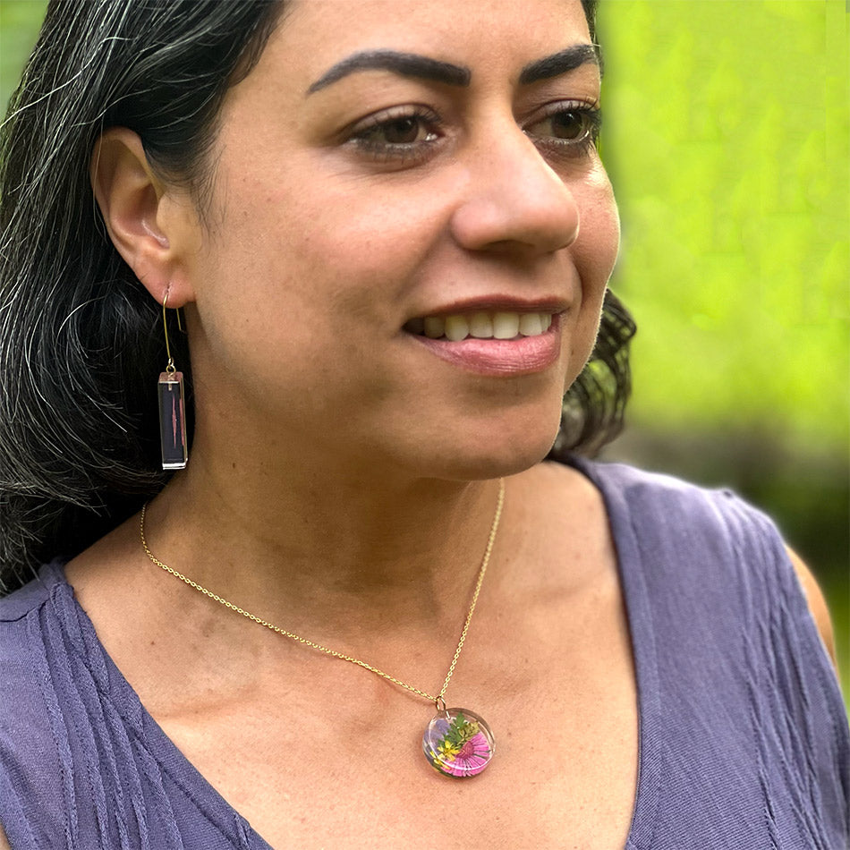 Fair trade eco resin botanical necklace handmade by artisans in Colombia.