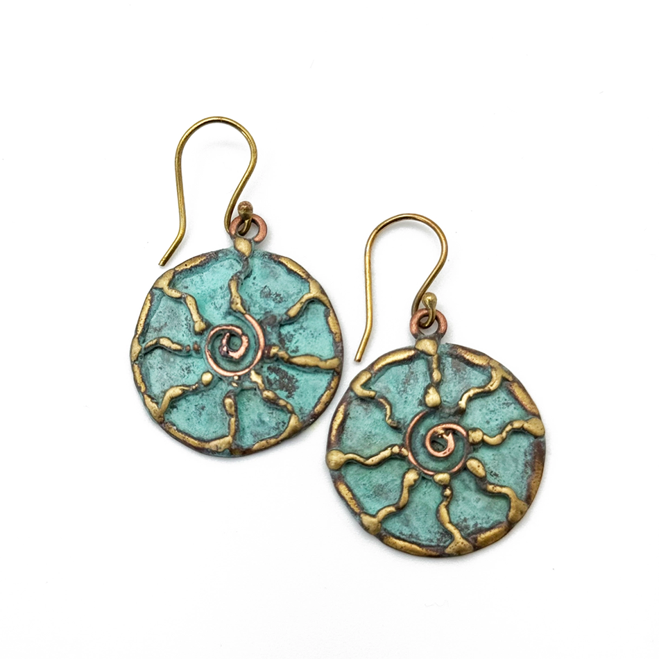 Round dangle earrings with brass sun and green patina finish.