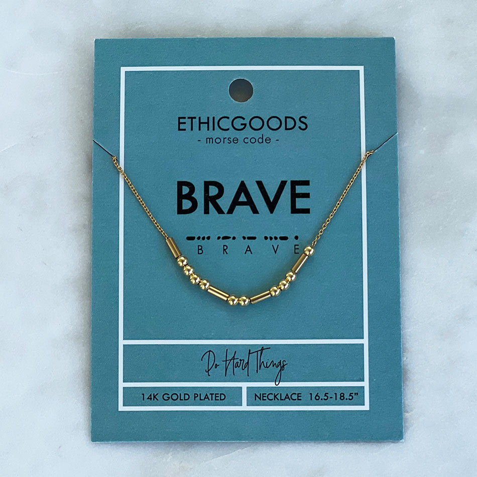 Gold morse code Brave bracelet handmade by survivors of human trafficking in Thailand