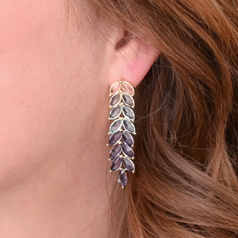Fair trade earrings with a long chandelier made of colorful crystals.