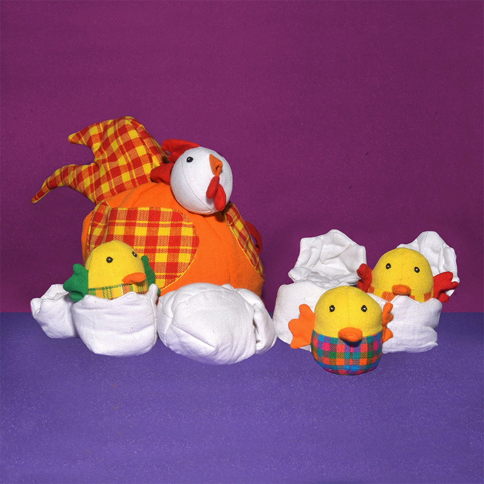 cotton play set with orange hen and several chicks popping out of eggs
