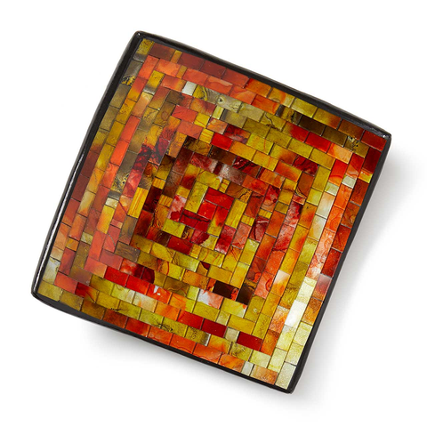 Square shallow bowl with orange, yellow and brown glass mosaic pattern.