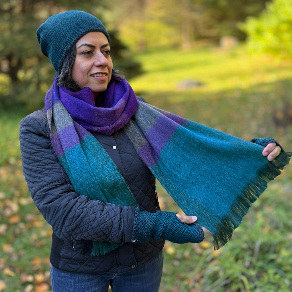 Alpaca scarf with teal purple and gray plaid  on model