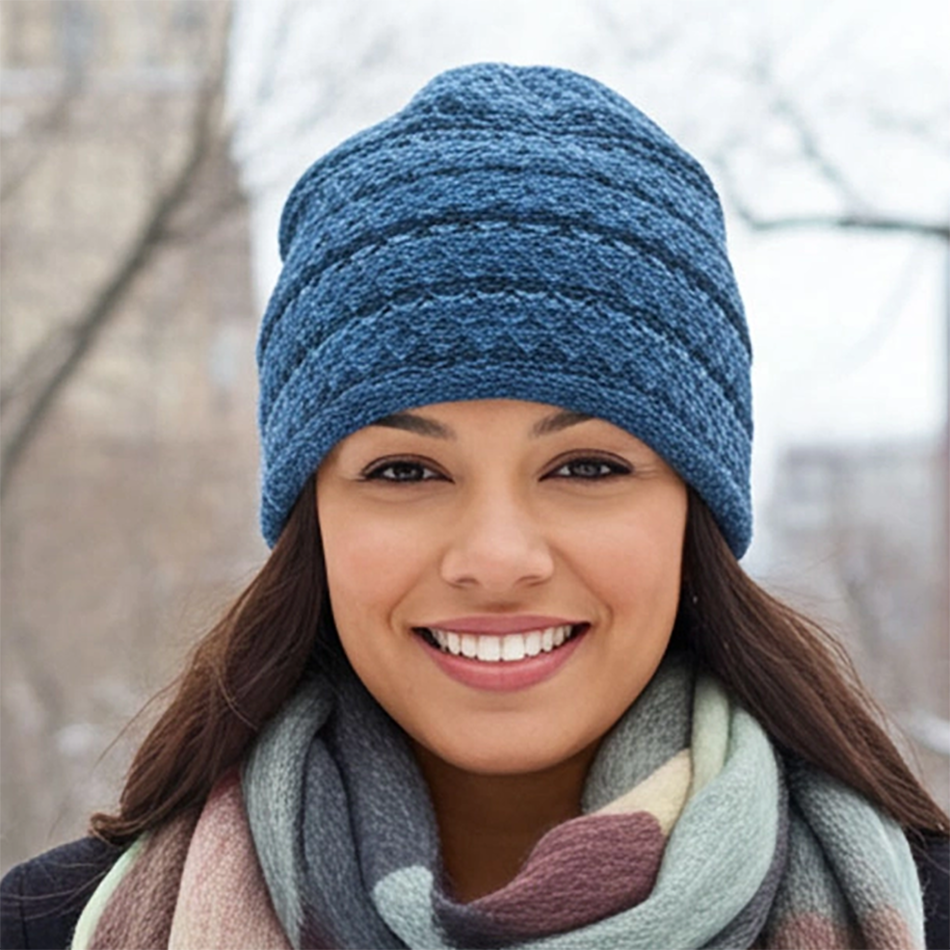 Blue knitted baby alpaca hat on model