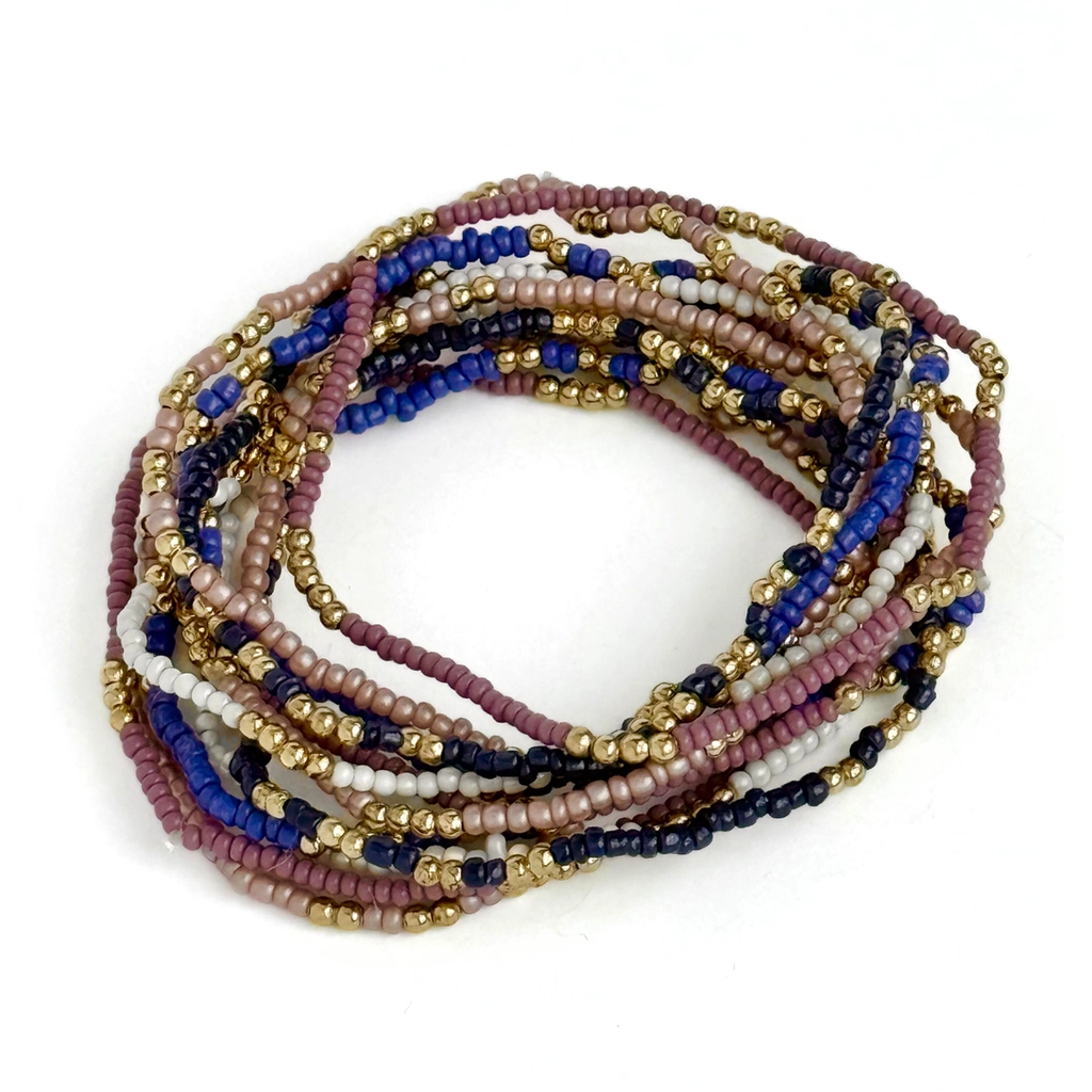 Set of 12 bracelets with tiny seed beads in purple, blue, pink white and gold.