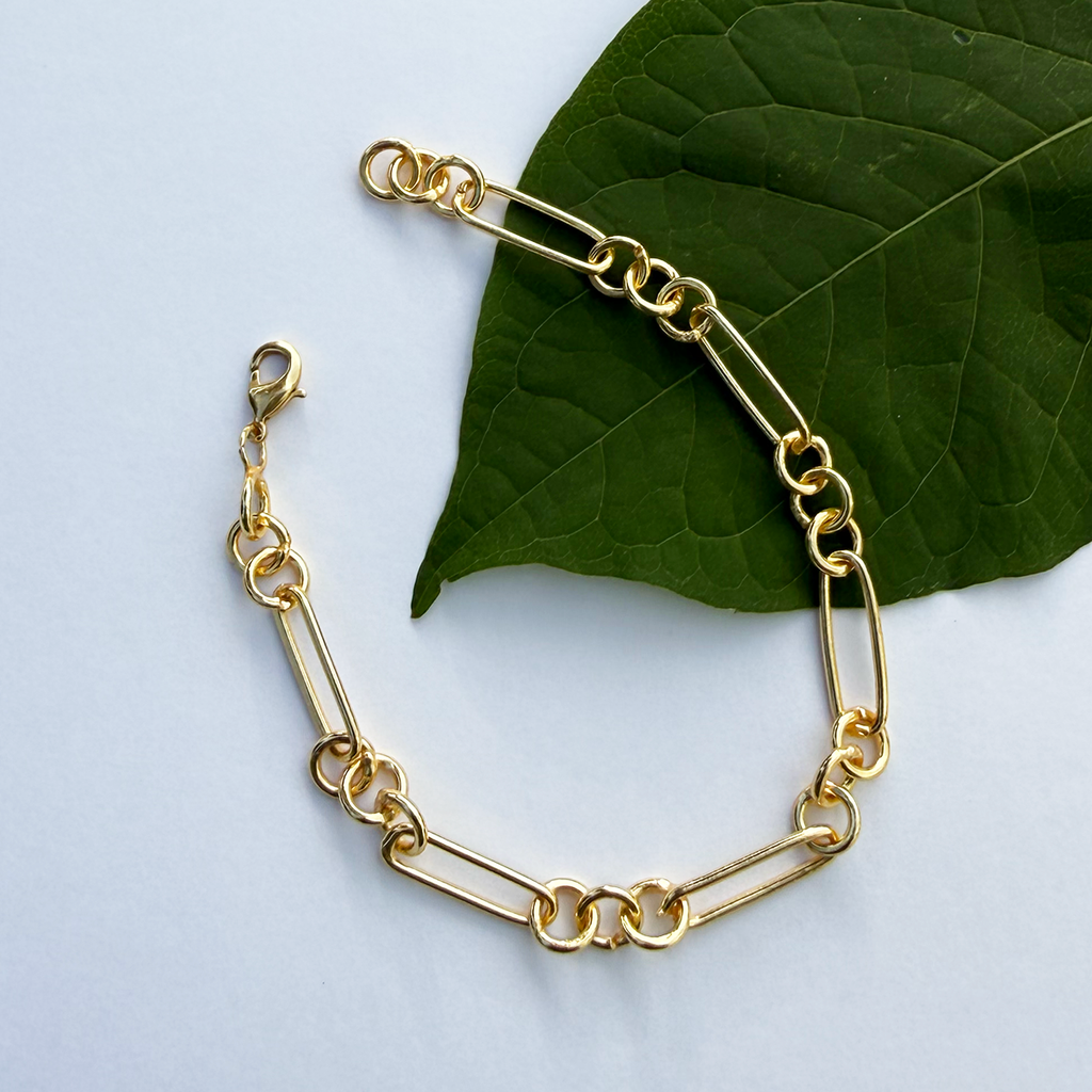 Gold chain link bracelet open clasp