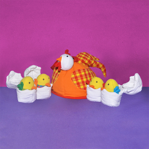 cotton play set with orange hen and several chicks popping out of eggs