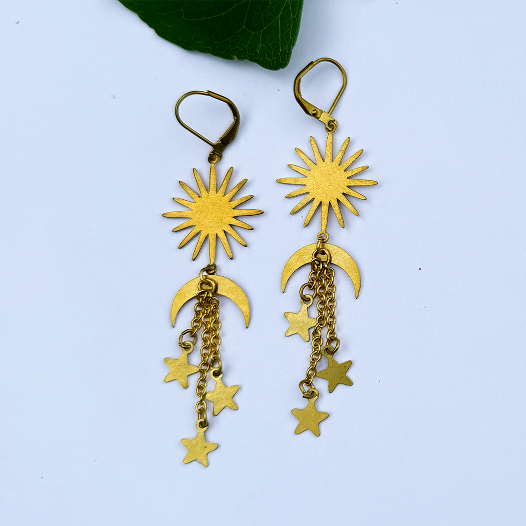 Long brass dangle earrings with sun, moon and stars