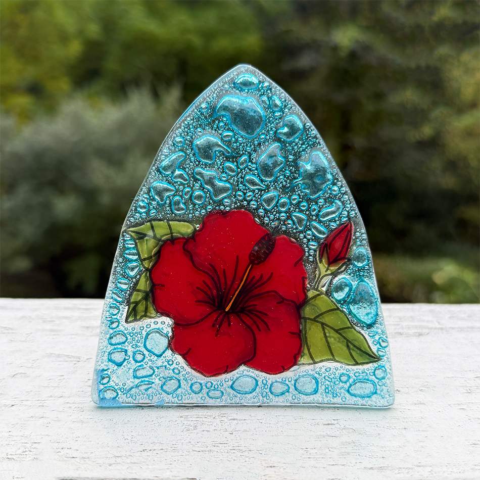 Glass nightlight with red hibiscus flower
