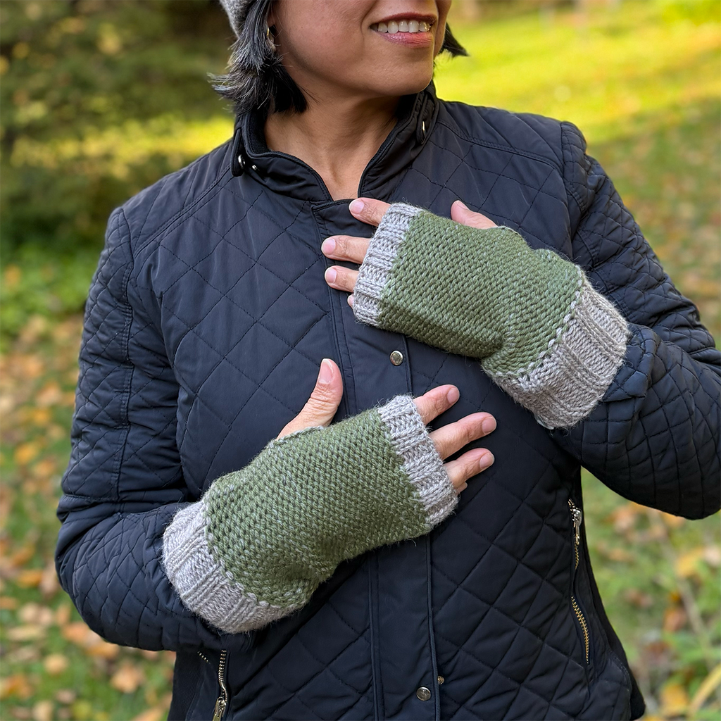 Baby alpaca fingerless gloves olive green and gray on model