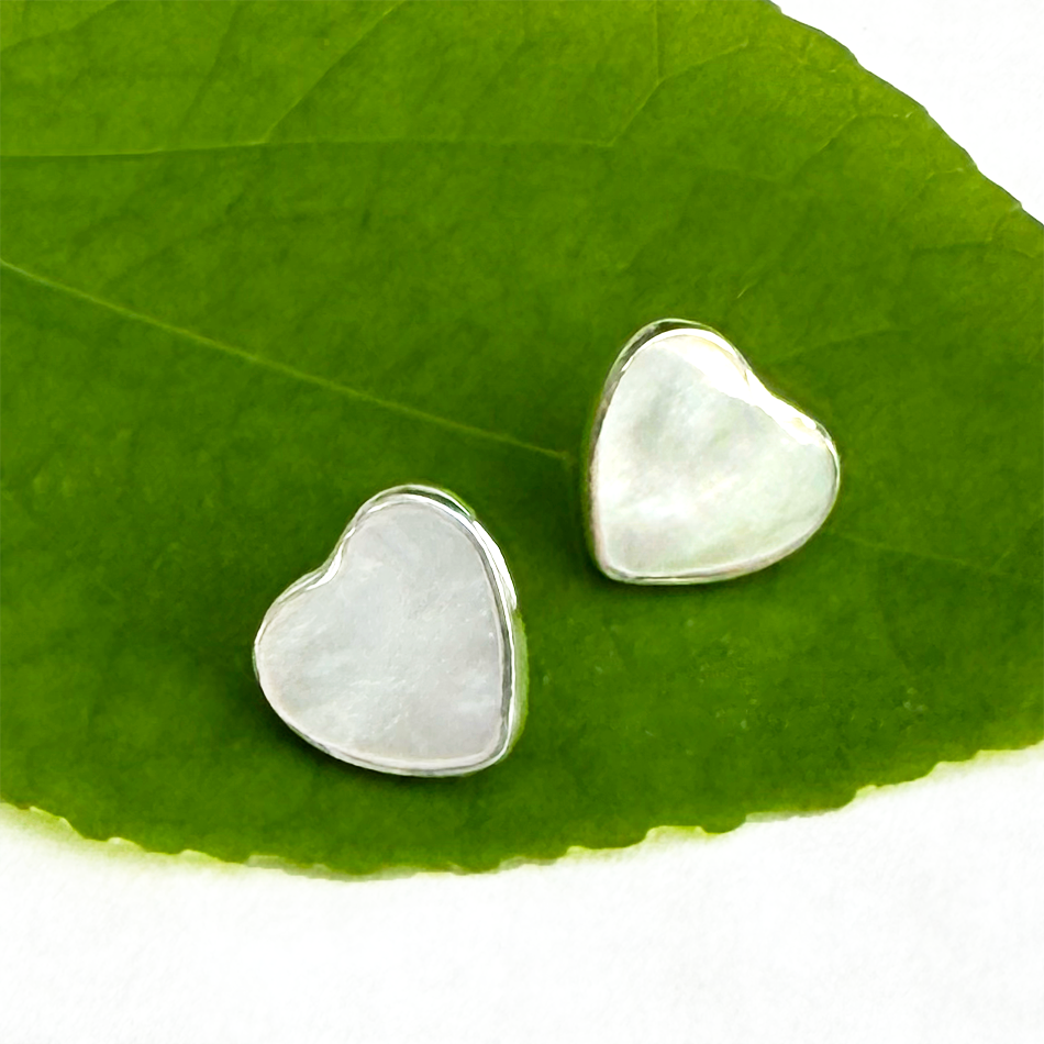 Mother-of-pearl heart studs in sterling silver casing