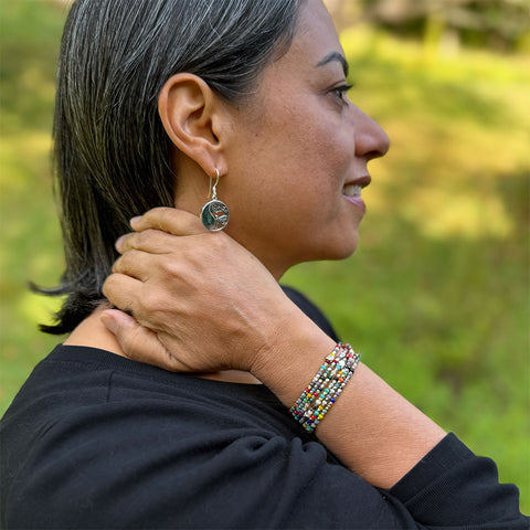 Fair trade bracelet with colorful and silver beads.