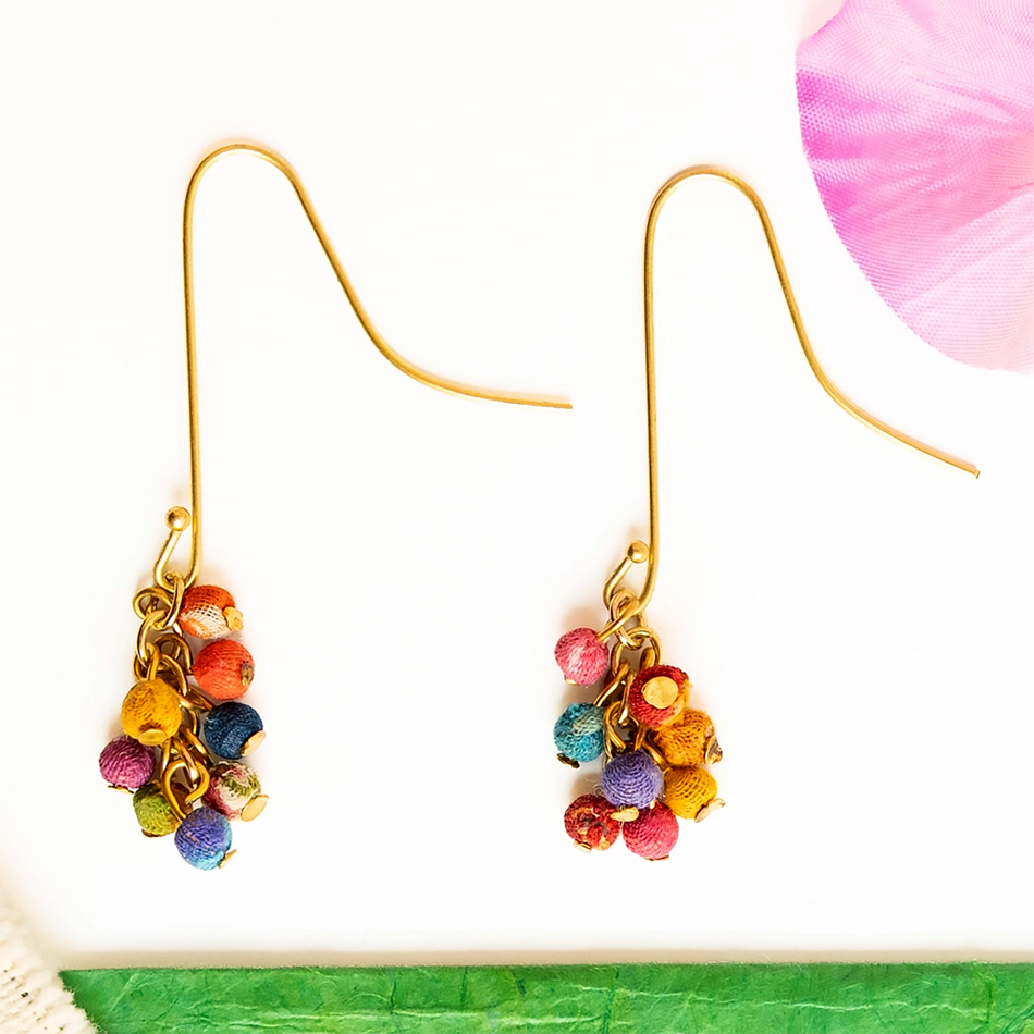 Earrings with long brass wire and a cluster of colorful sari beads on the bottom