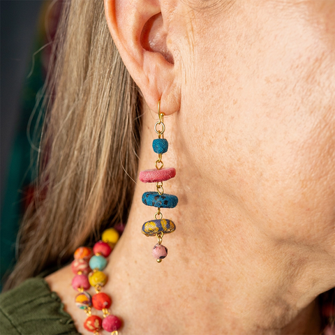 Colorful dangle earrings made out of recycled sari fabric beads. Five bead of different colors and shapes.