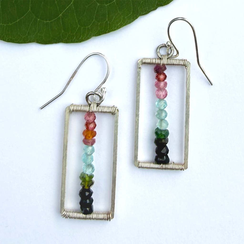 Silver rectangle earrings with tiny multi-colored tourmaline stones in the middle