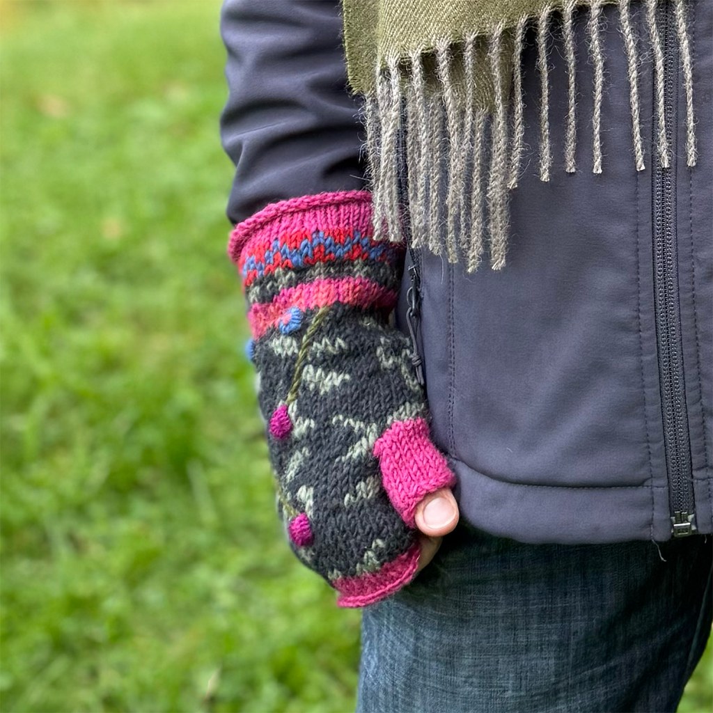 Wool knit fingerless gloves pink black embroidered design on model