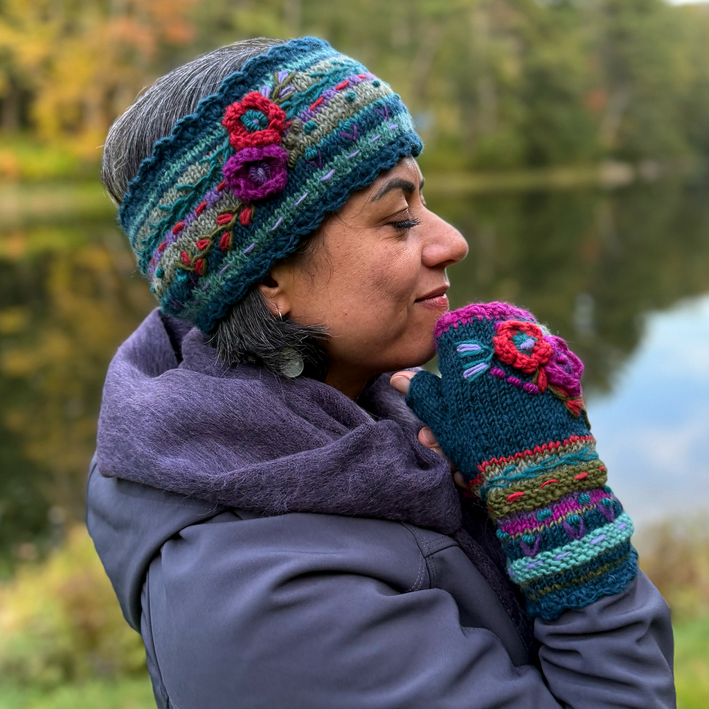 Wool knit fingerless gloves and headband  teal with red and pink embroidered flowers on model