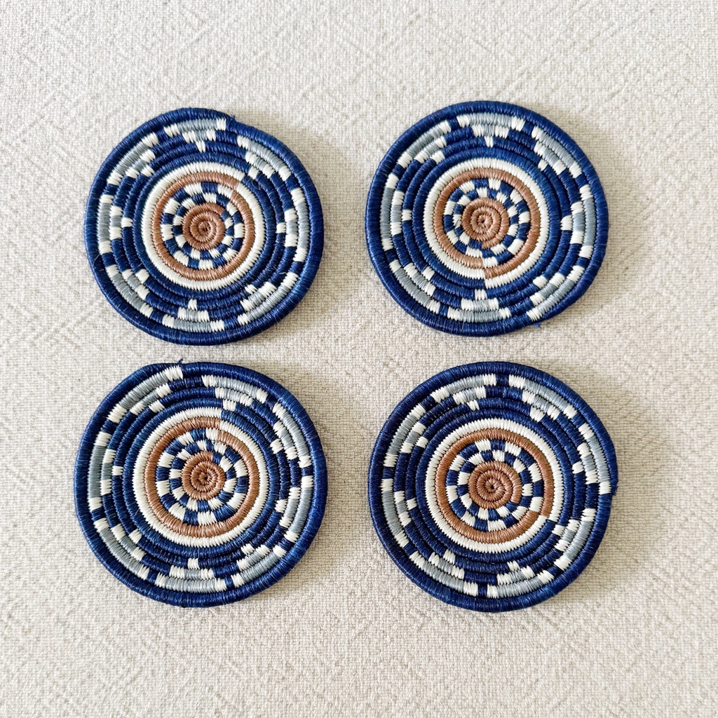 Set of 4 handwoven coasters round blue tan white geometric pattern