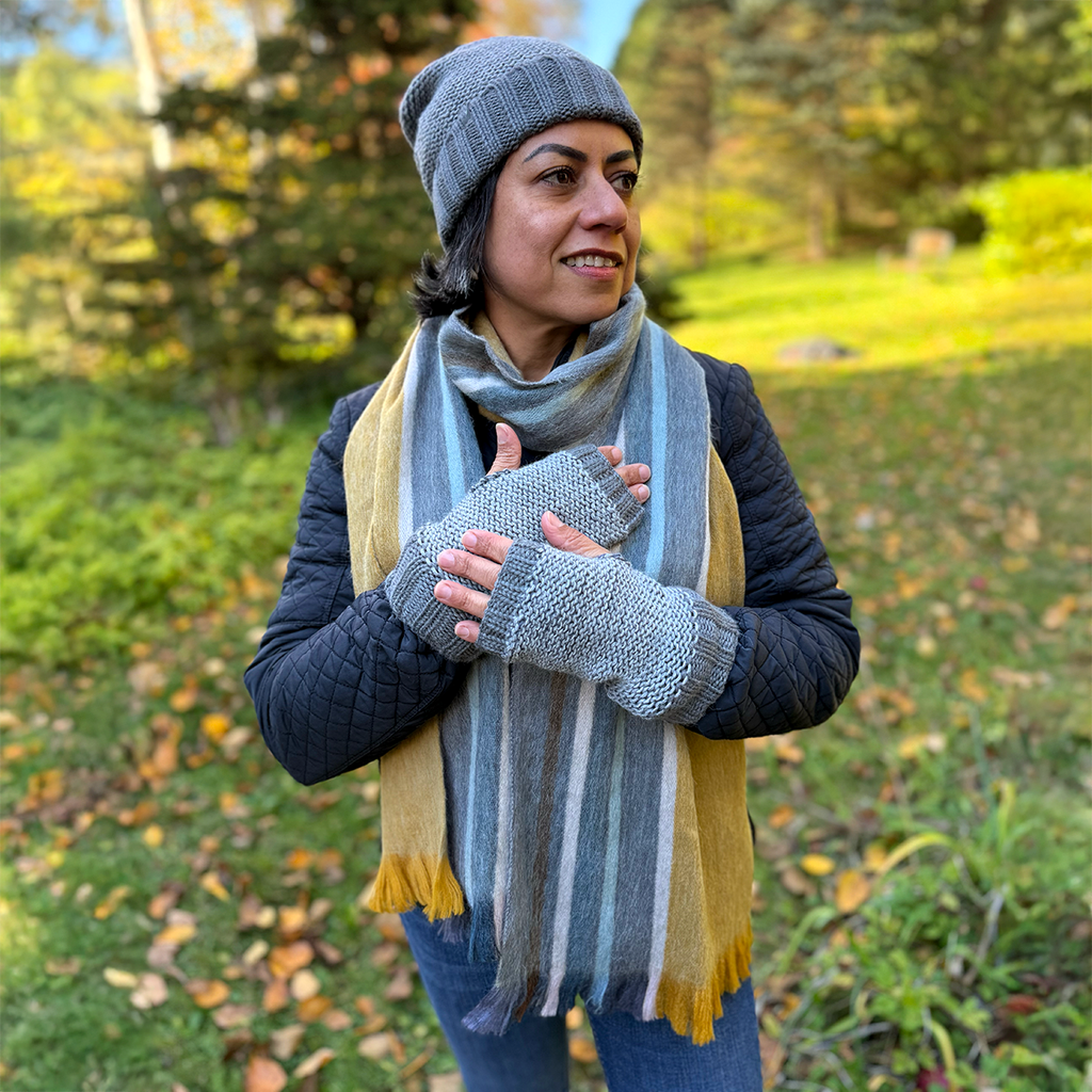 Gray two tone alpaca fingerless gloves on model