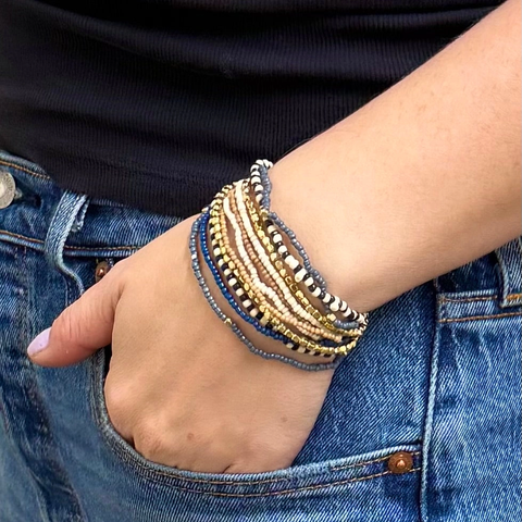 Set of 11 beaded bracelets in natural tones