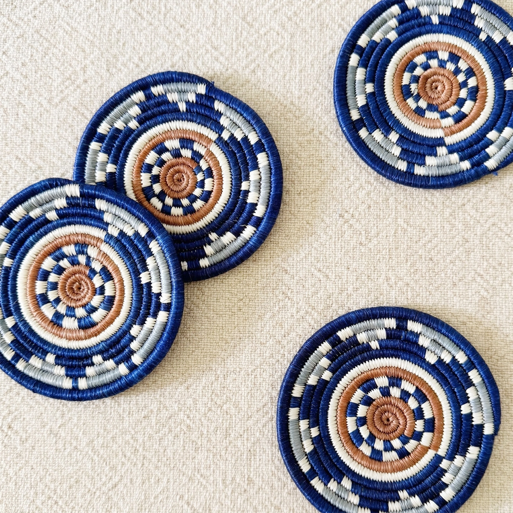 Set of 4 handwoven coasters round blue tan white geometric pattern