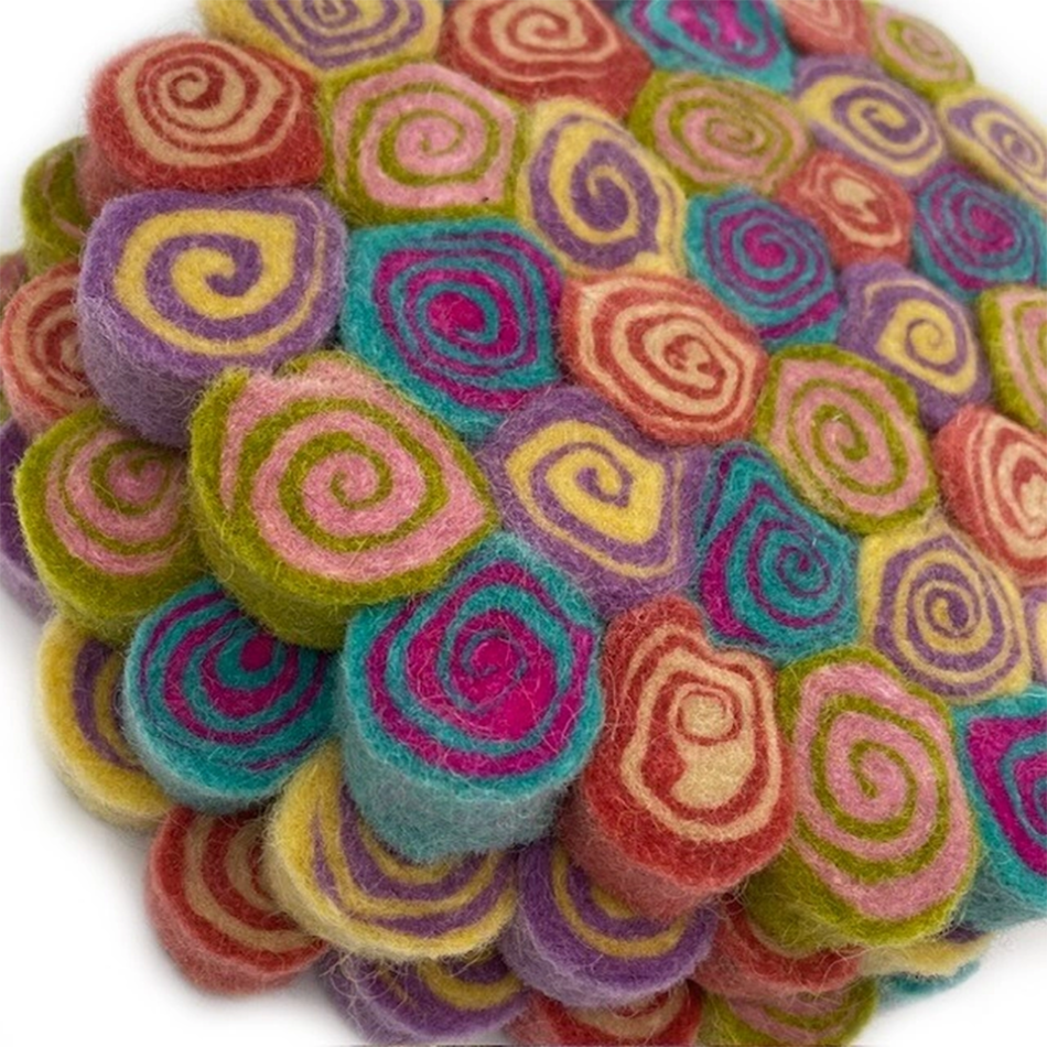 Round colorful felted trivet with swirl design