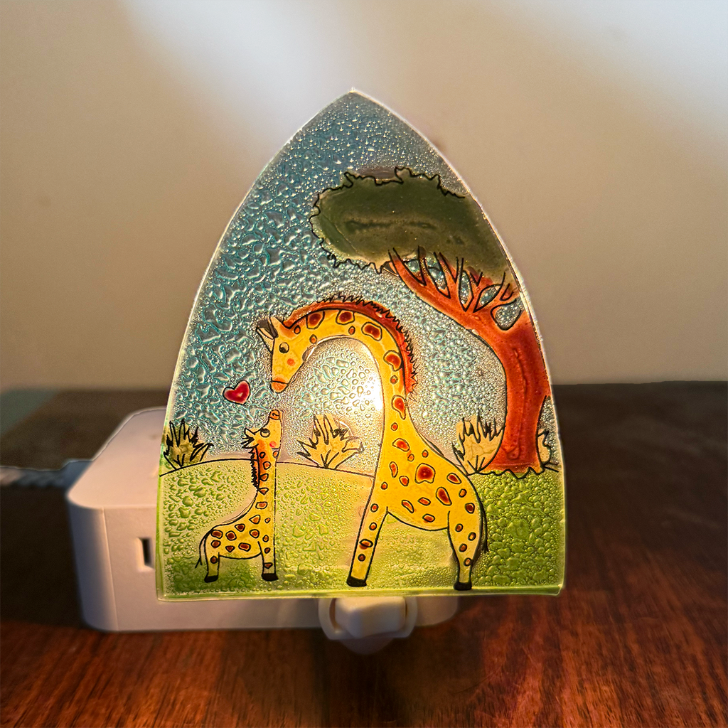 Glass night light with giraffe design