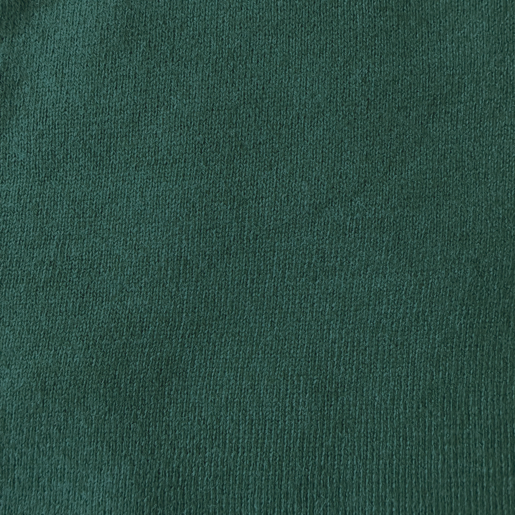 Cashmere green fabric close up
