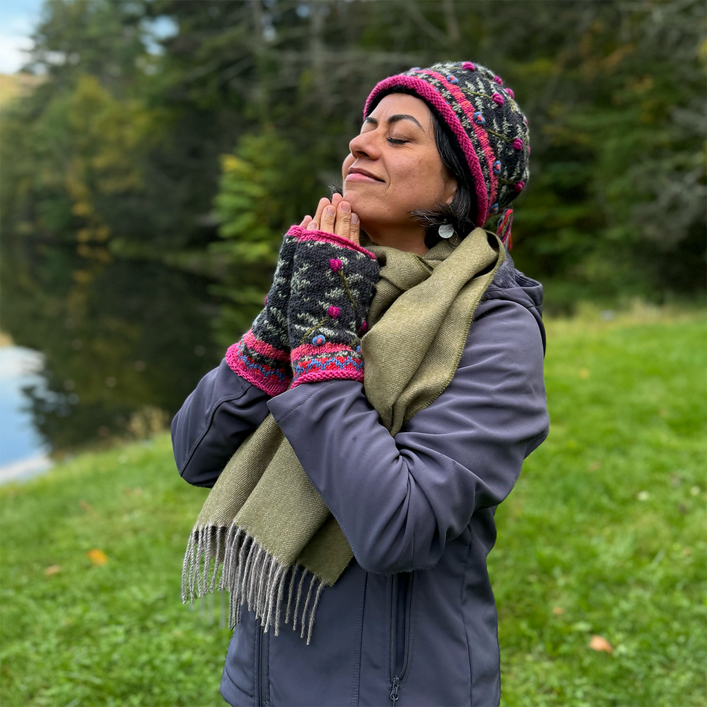 Wool knit fingerless gloves and hat pink black embroidered design on model