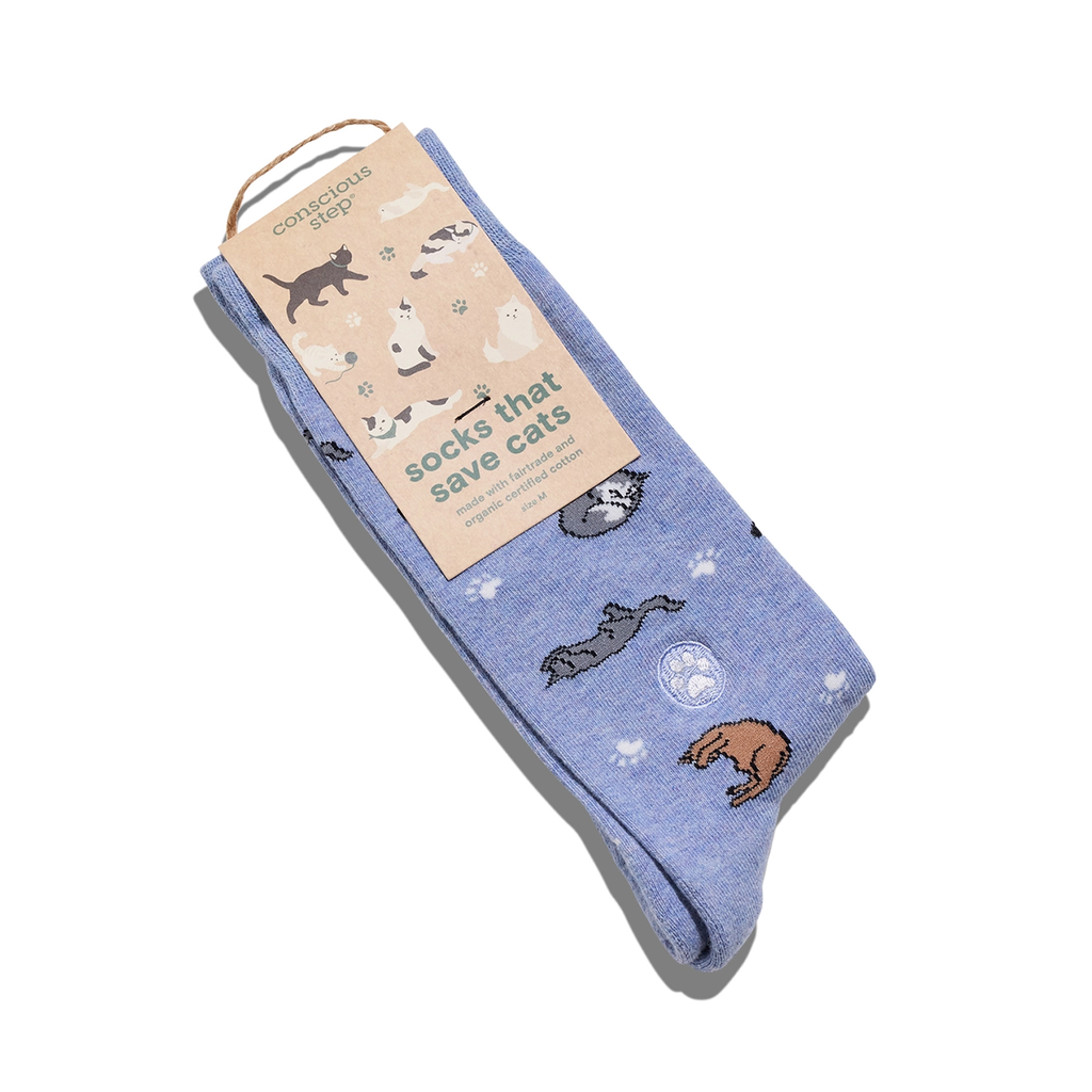 Light blue sock with sleeping cats and tag