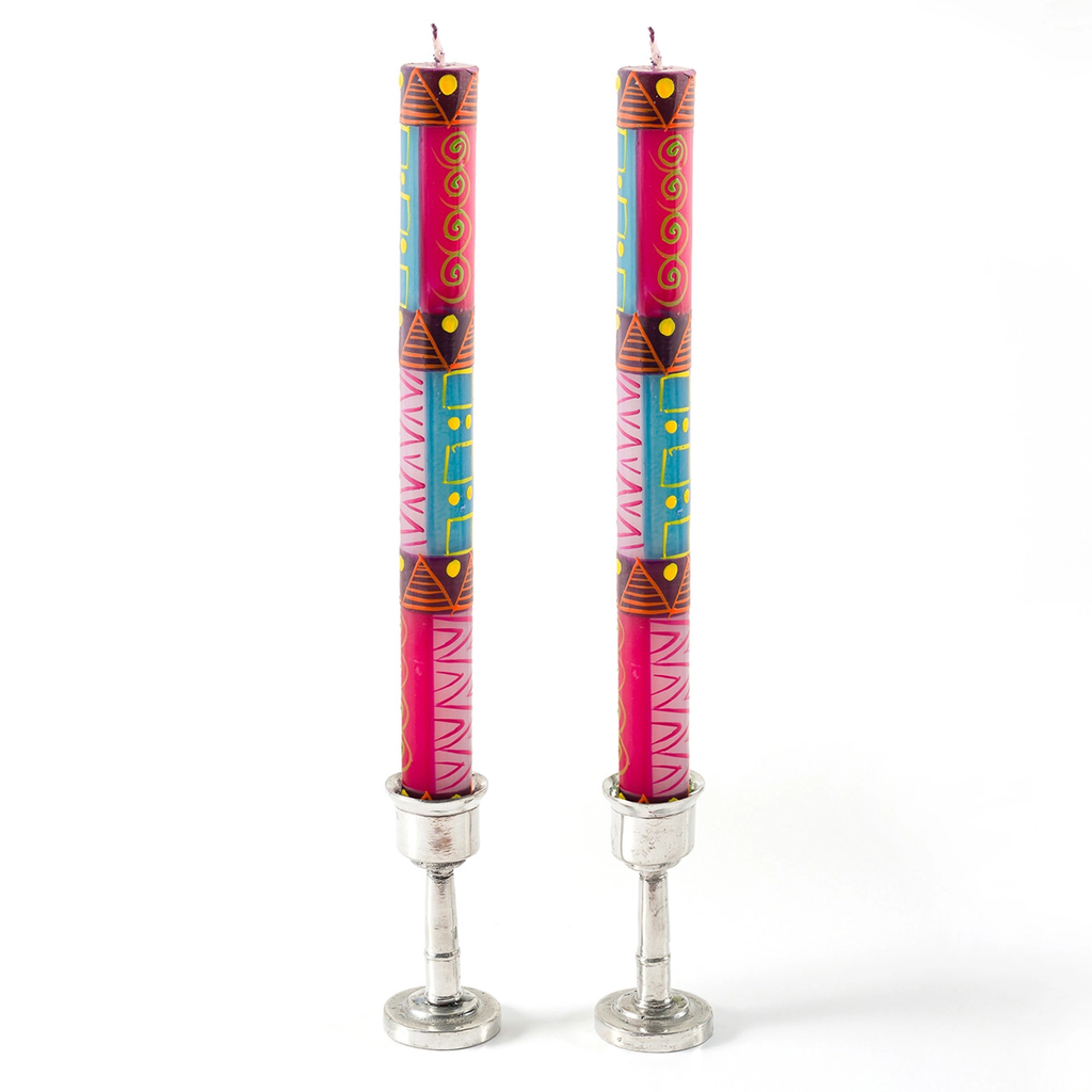 Hand-painted dinner candles with pink, blue, white yellow design