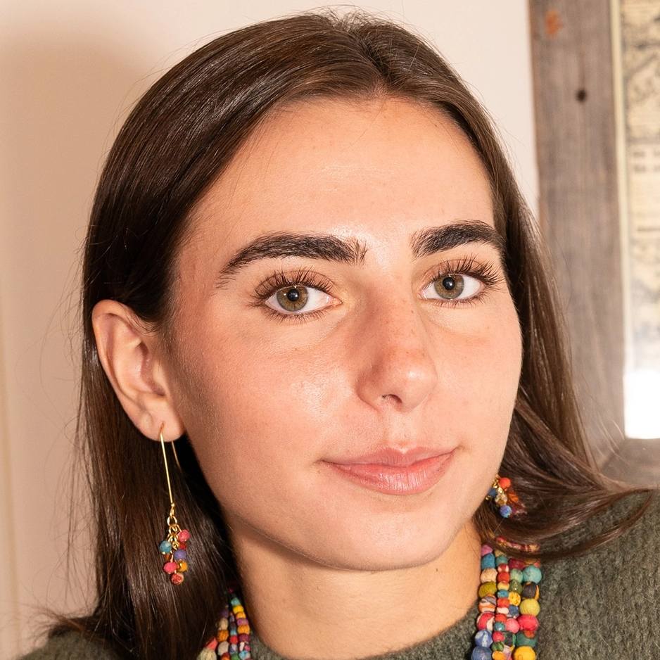 Earrings with long brass wire and a cluster of colorful sari beads on the bottom