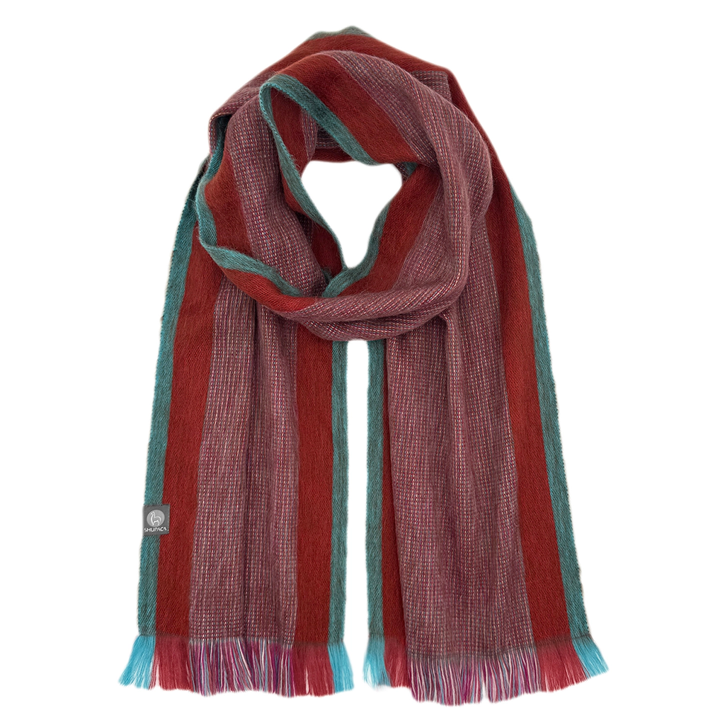 Alpaca scarf with mostly reds and a thin turquoise stripe.