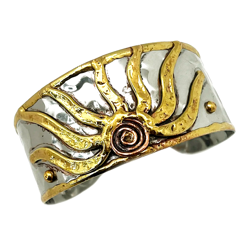 Silver-plated wide cuff with gold sun design.