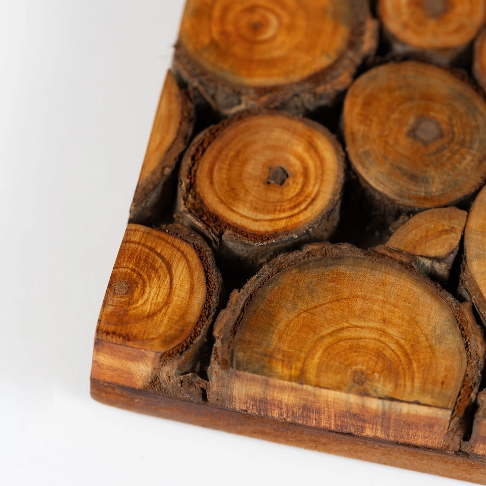 Square trivet made out of slices of mango wood