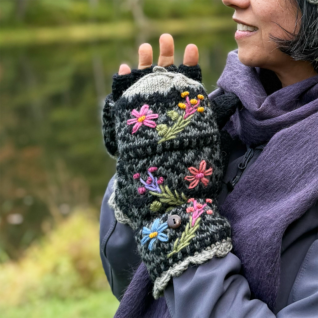 Wool knit convertible mittens black gray with embroidered flowers on model