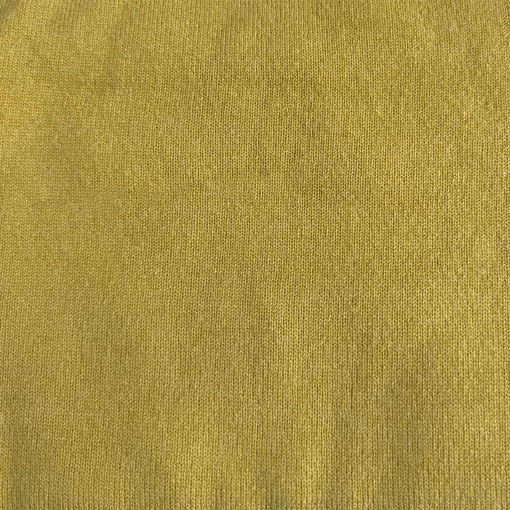 Yellow cashmere fabric close up