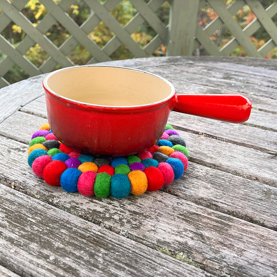 Fair trade felt ball rainbow trivet