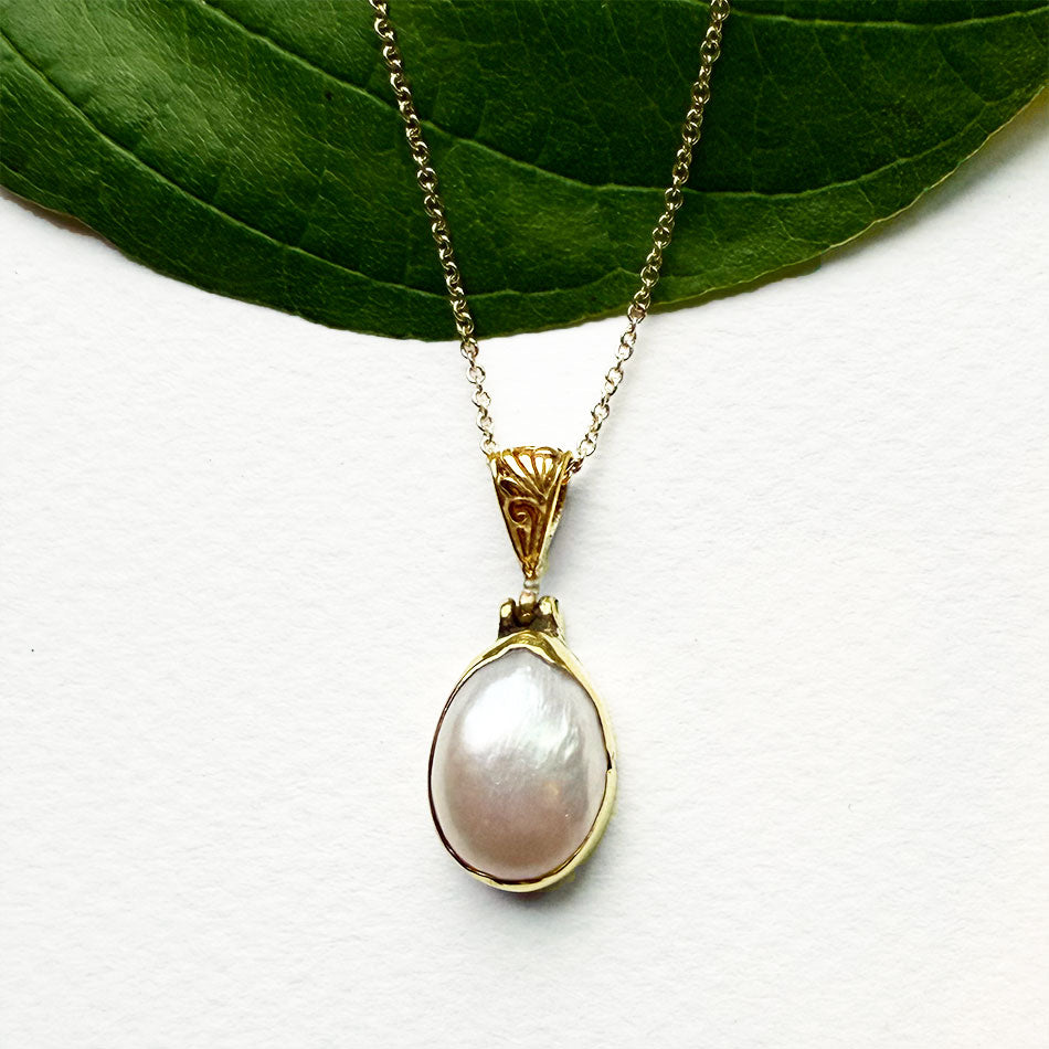 Fair trade pearl filigree necklace