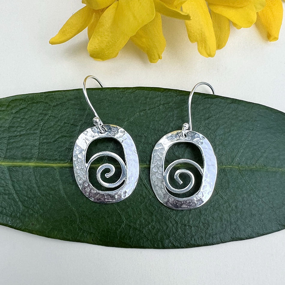 Fair trade hammered sterling silver spiral earrings
