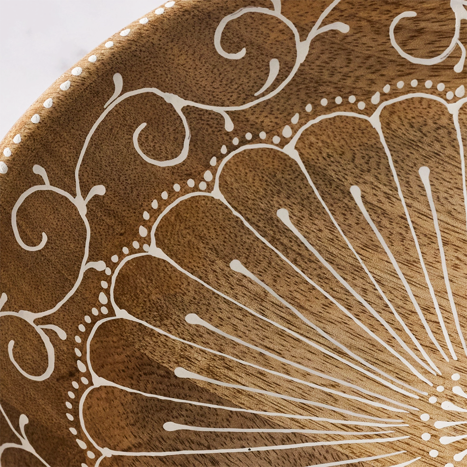 Close up of Mango wool bowl with painted white vine design