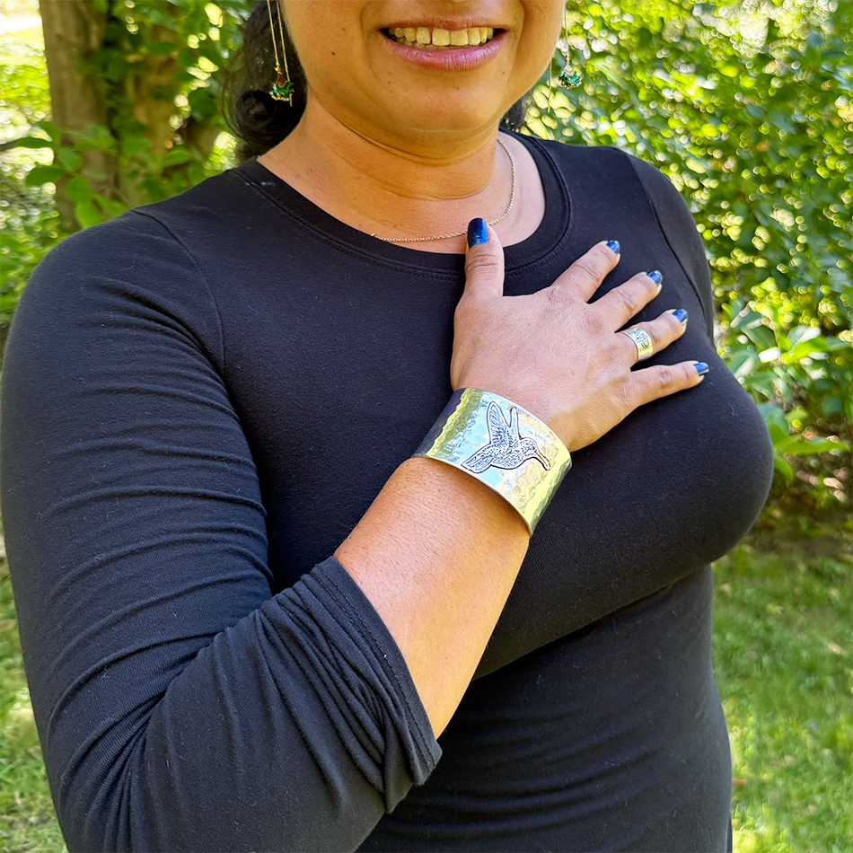 Fair trade silver hummingbird wide cuff bracelet.